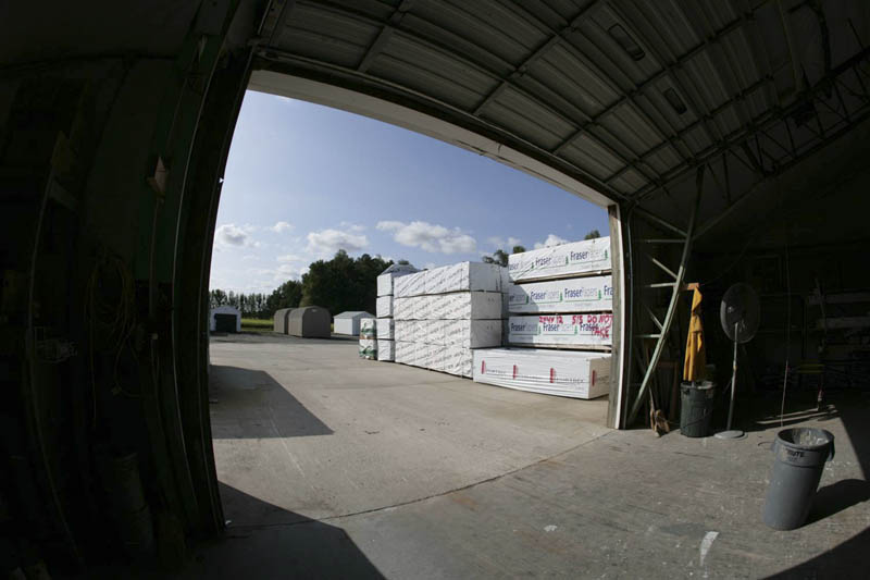 Through this overhang door go the sheds to a truck for delivery.