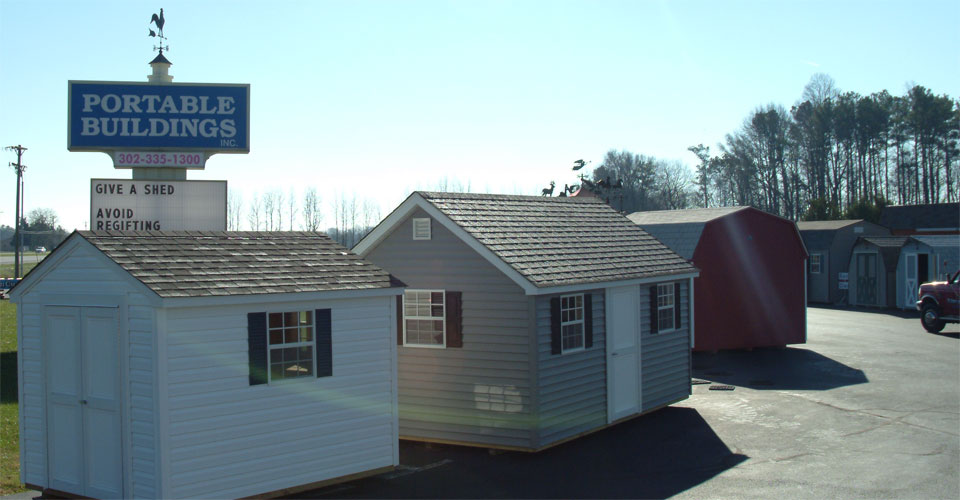 Portable Buildings Inc Factory in Milford, DE has a large inventory of sheds and wooden swing sets